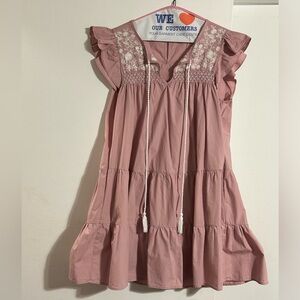 Made by L Love , babydoll dress , size is a large and color is pink